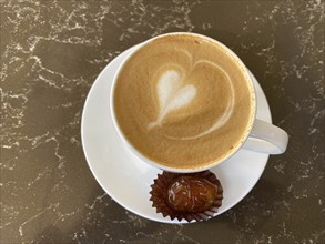 Cappuccino with traditional date, heart-shaped milk foam, Dubai, United Arab Emirates, VAR, Asia