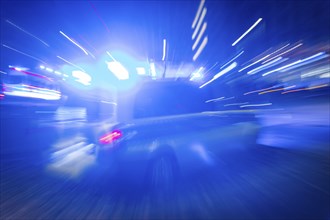 A police vehicle in action, with blue light switched on, Dresden, Saxony, Germany, Europe