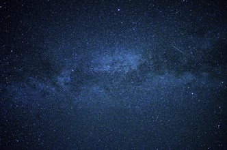 Section of the Milky Way with a shooting star, seen in summer over Upper Bavaria, Germany, Europe