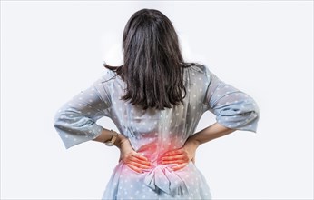 Girl with spine problems isolated. Woman with back pain on isolated background. lumbar problems