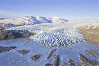 Aerial view over ice tongue Falljökull in winter, one of many outlet glaciers of Vatnajökull, Vatna