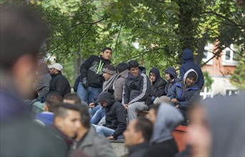 Refugees from Syria waiting to be registered at the Central Reception Centre for Asylum Seekers at