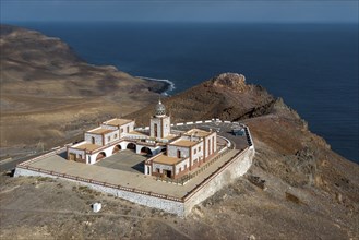 Bird's eye view of aerial view of building complex of lighthouse Faro de la Entallada from 50s year