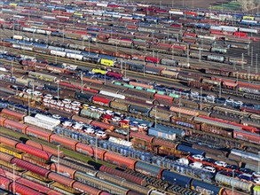 Deutsche Bahn AG marshalling yard. Many goods trains are parked on the tracks with tank wagons, car