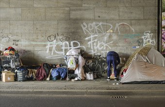 Homeless people at Bahnhof Zoo, Hertzallee, Charlottenburg, Berlin, Germany, Europe