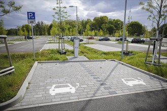 Symbolic photo. Parking spaces and charging points for electric cars are located in a newly built