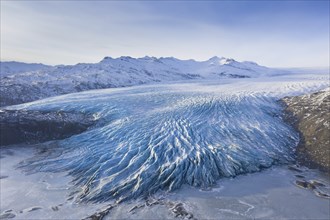 Aerial view over ice tongue Falljökull in winter, one of many outlet glaciers of Vatnajökull, Vatna