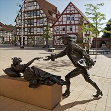 Sleeping Beauty sculpture by Karin Bohrmann-Roth in the old town, fairy tale based on the Brothers