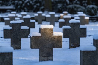 Crosses of a war cemetery from the Second World War in the snow, Südwest-Kirchhof, historic