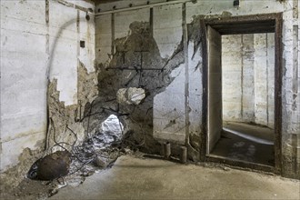 Unexploded shell went through wall of bunker at the WWII Batterie d'Azeville, Azeville Battery,