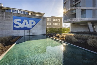 Logo and building of the listed software company SAP, headquarters in Walldorf, Baden-Württemberg,