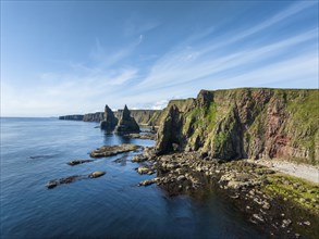 Aerial view of the rugged coastal landscape with the Duncansby Stacks, Duncansby Head coast, County