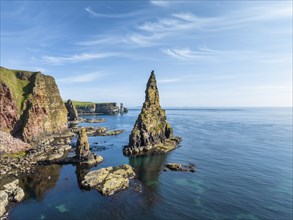 Aerial view of the rugged coastal landscape with the Duncansby Stacks, Duncansby Head coast, County