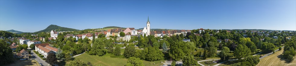 Aerial panorama of the town of Engen, on the left on the horizon the Hegau volcanoes Hohenstoffeln