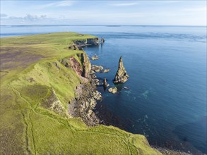 Aerial view of the rugged coastal landscape with the Duncansby Stacks, Duncansby Head coast, County