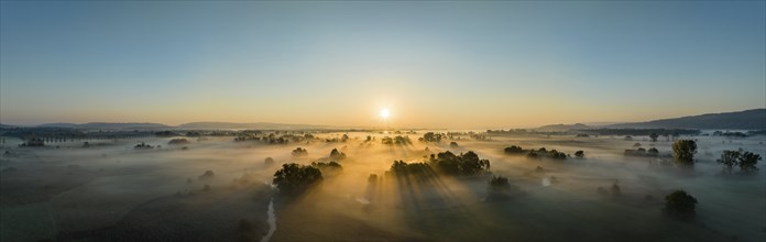 Aerial panorama of the Radolfzeller Aachried at sunrise and ground fog, on the horizon the western