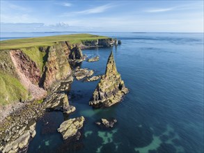 Aerial view of the rugged coastal landscape with the Duncansby Stacks, Duncansby Head coast, County