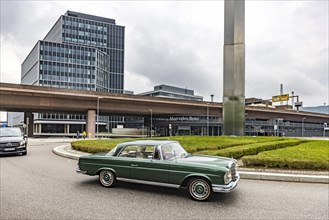 Mercedes classic car in front of the Mercedes Benz Group headquarters in Untertürkheim, Stuttgart,