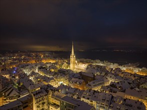 Aerial view, night view of the snow-covered and illuminated old town of Radolfzell on Lake