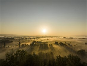 Aerial view of Radolfzeller Aachried at sunrise and ground fog, on the horizon the western part of