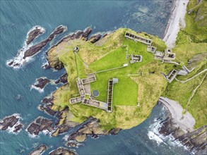 Aerial view of Dunnottar Castle ruins on the North Sea coast, Stonehaven, Aberdeenshire, Scotland,