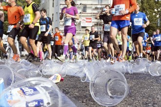 Empty drinking cups lying on the street along the marathon route, Berlin, 25.ö09.2016