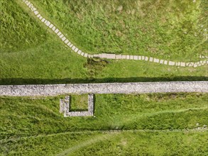 Aerial view, top down view of Hadrian's Wall with foundations of former watchtower, Steel Rigg,