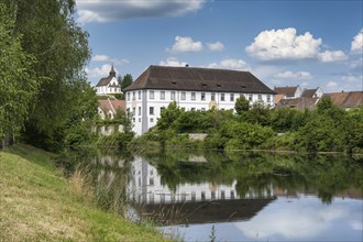 View from the Rhine island Rheinau to the former Benedictine abbey and the mountain church St.