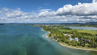 Aerial panorama of the Mettnau peninsula with the landing stage, restaurant and spa centre,