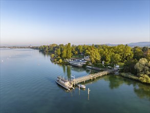 Aerial view of the Mettnau peninsula with the landing stage, solar ferry and catering business,