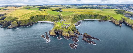 Aerial panorama of Dunnottar Castle ruins on the North Sea coast, Stonehaven, Aberdeenshire,