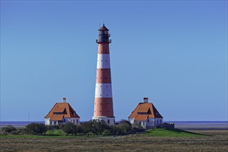 Westerheversand lighthouse on a terp near Westerhever in the Wadden Sea National Park. UNESCO World