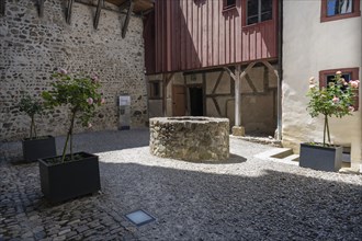 The inner courtyard with fountain of Hohenklingen Castle near Stein am Rhein, Canton Schaffhausen,