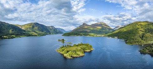 Aerial panorama of the western part of the freshwater loch Loch Leven with the historic island of