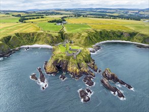 Aerial view of Dunnottar Castle ruins on the North Sea coast, Stonehaven, Aberdeenshire, Scotland,