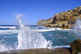 Wave and spray, Cala de Sant Vicenc and Cape Formentor, Pollença, Serra de Tramuntana, Majorca,