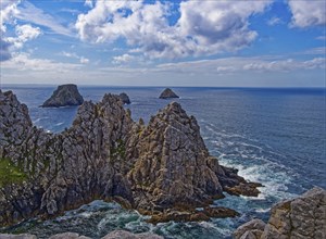 Formation of rugged rocks at Pointe de Penhir, a cape on the Crozon Peninsula, on the Atlantic