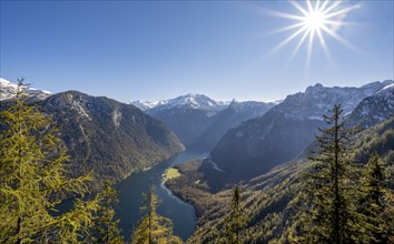 Panoramic view of the Königssee from the Archenkanzel viewpoint, autumnal forest and snow-capped