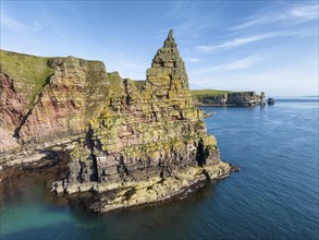 Aerial view of the rugged coastal landscape with the Duncansby Stacks, Duncansby Head coast, County