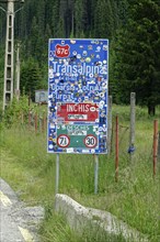 Signpost on the Transalpina high road, which leads over the mountains of the Fagaras Mountains,