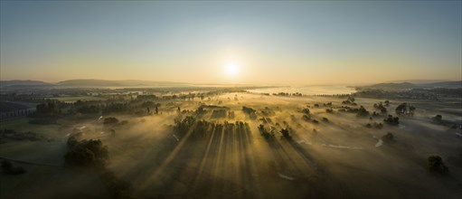 Aerial panorama of the Radolfzeller Aachried at sunrise and ground fog, on the horizon the western