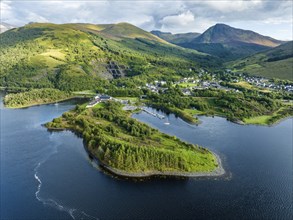 Aerial view of the village of Ballachulish with the harbour and the former slate quarry at the