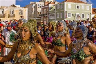 Colourful costumed, pretty women are dancing. Carnival. Mindelo. Cabo Verde. Africa