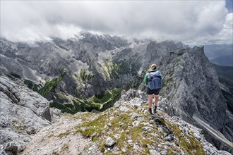 Mountaineer climbing the Waxenstein, Wetterstein Mountains, Garmisch-Patenkirchen, Bavaria,