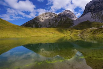 Rappensee, behind it Linkerskopf, 2459m, Rotgundspitze, 2485m, and Hochgundspitze, 2459m, AllgÃ¤u