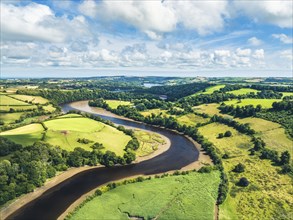 Sharpham Meadows and Marsh over River Dart from a drone, Totnes, Devon, England, United Kingdom,