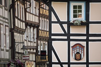 Half-timbered houses with town coat of arms, Deutsche Fachwerkstrasse, Hann. Münden or Hannoversch