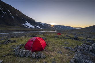 Two Red Tents in Kaskasavagge Valley, Gaskkasjohka River, Kebnekaise Massif, Lapland, Sweden,