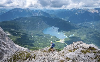 Mountaineer at Waxenstein, Eibsee lake, Wetterstein Mountains, Garmisch-Patenkirchen, Bavaria,