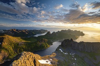 View over Senja's fjords and mountain peaks under the midnight sun, Mount Grytetippen, Senja,